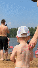 Summer beach day unfolds at Malakhovka lake, Russia