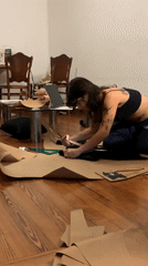 Person drafts patterns on floor in Buenos Aires midnight session