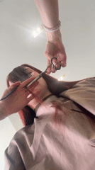 Woman documents hair salon visit in Mozhga, Russia