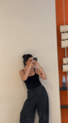 Person takes selfies near art supplies in Belgrade district