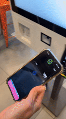 Contactless iPhone payment observed at Barcelona self-service kiosk