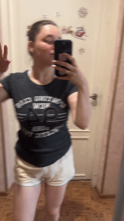 Woman takes series of mirror selfies in Yaroslavka home