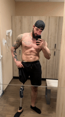 Man takes mirror selfie in Sofia gym locker room