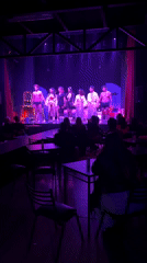 Late-night theatrical performance captured in Buenos Aires venue
