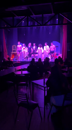 Late-night theatrical performance captured in Buenos Aires venue