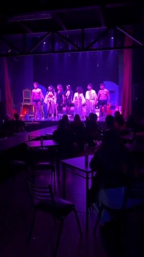 Late-night theatrical performance captured in Buenos Aires venue