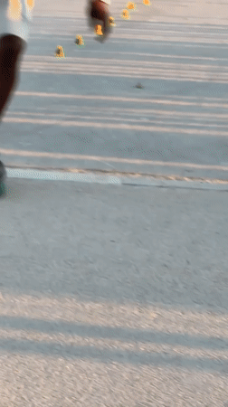 Roller skater runs a cone slalom course in Paris