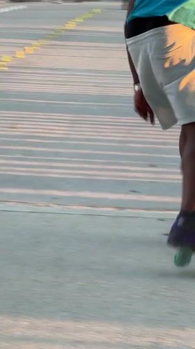 Roller skater runs a cone slalom course in Paris