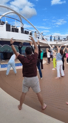 Cruise passengers exercise, swim during Genoa port stop