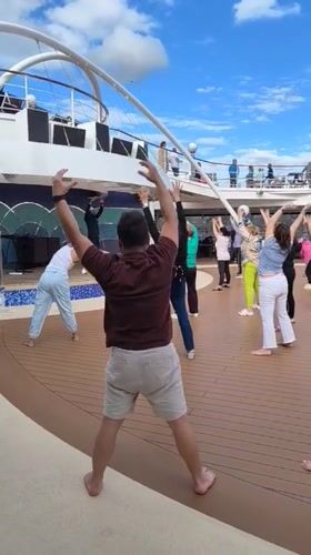 Cruise passengers exercise, swim during Genoa port stop
