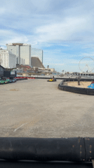 Atlantic City Boardwalk: go-karts, tram, and Ferris wheel in action