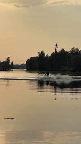 Jet skier enjoys calm evening waters near Shchelkovo