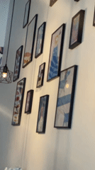 Colorful kids' café interior with balloon décor and gallery walls