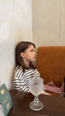 Family breakfast in Krasnoyarsk cafe, child grows sleepy