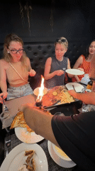 Tourists dine and sightsee on Maafushi island, Maldives