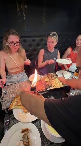 Tourists dine and sightsee on Maafushi island, Maldives