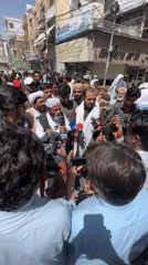 Media gathering focuses on two men in Quetta street