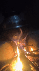 Open fire cooking on a rainy morning in the Dharamsala foothills
