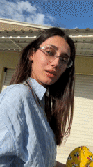 Woman in striped shirt spotted outdoors in Sutomore