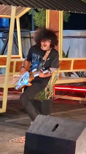 Live band performs outdoor street concert in Lhokseumawe, Indonesia