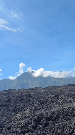 Tourists capture volcanic landscape views in Kintamani, Indonesia
