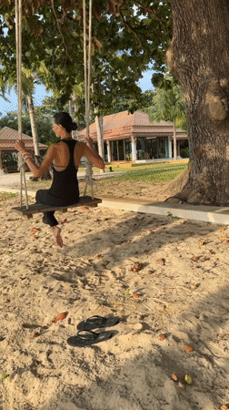 Ko Samui temple statues and beachside swing, one morning