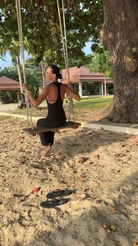 Ko Samui temple statues and beachside swing, one morning