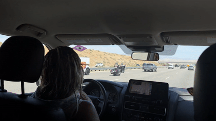 Female driver with braided hair spotted on Palm Springs highway