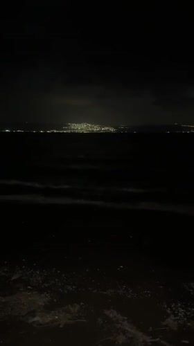 Nighttime Sea of Galilee shoreline captured in Golan region