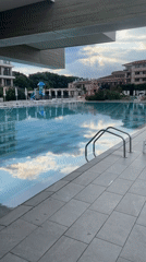 Empty beach and pool at an Obzor resort near sunset