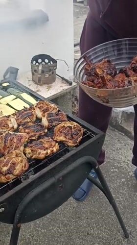 Backyard BBQ in Annagry, grilled chicken fresh off the coals