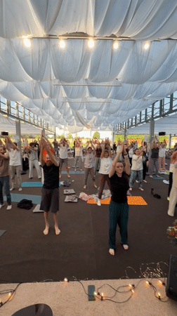 Early morning outdoor yoga class held in Zhirnosovo, Russia