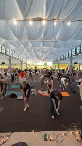 Early morning outdoor yoga class held in Zhirnosovo, Russia