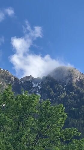 Mountain vista captured in Kaludra, Montenegro shows snow-capped peaks