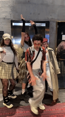Young adults dance and primp in Tashkent elevator area
