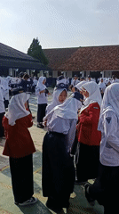 Indonesian students conduct early morning flag ceremonies across multiple locations