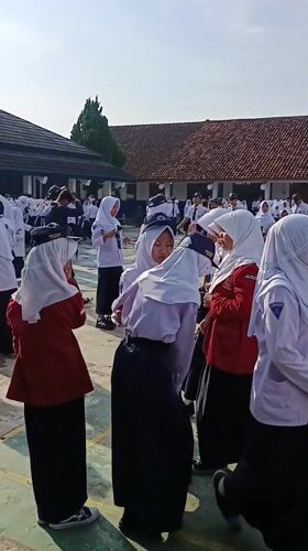 Indonesian students conduct early morning flag ceremonies across multiple locations