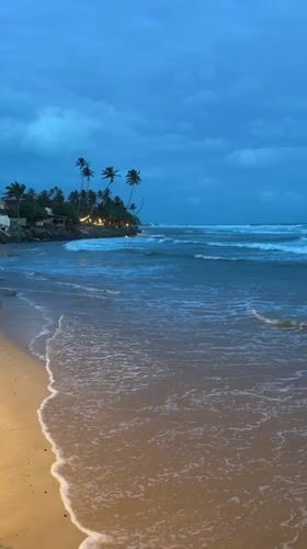 Twilight beachfront dining captured in Ahangama, Sri Lanka