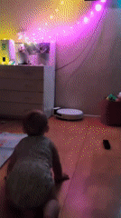 Baby's evening playtime documented across home setting