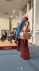 Young gymnast practices pommel horse routines in Sofia facility