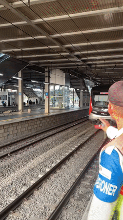 Train arrives at East Jakarta station with security present