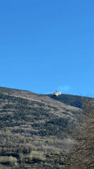 Helicopter filmed flying over Benasque, Spain mountains