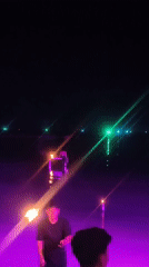 Fire performers and beach crowds light up a Ko Samui night
