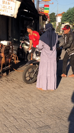 East Java street life: vendors, motorcycles, and morning foot traffic