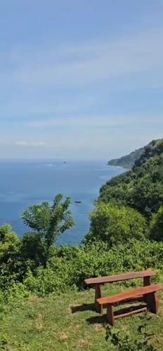Morning coastal scenes captured in Karangasem as cruise ship passes