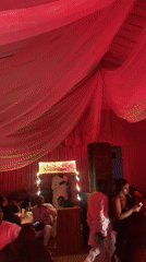 Indoor party observed in Barakin Lerawi with red lighting