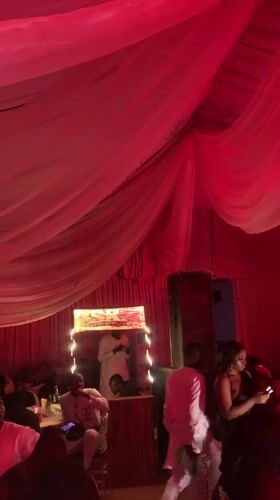 Indoor party observed in Barakin Lerawi with red lighting