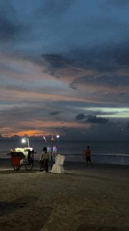 Evening commerce and dining preparations observed at Jimbaran beach