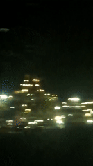 Blurry bokeh of city lights at night in southern Israel