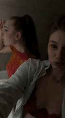 Young women take selfies indoors in Kazan